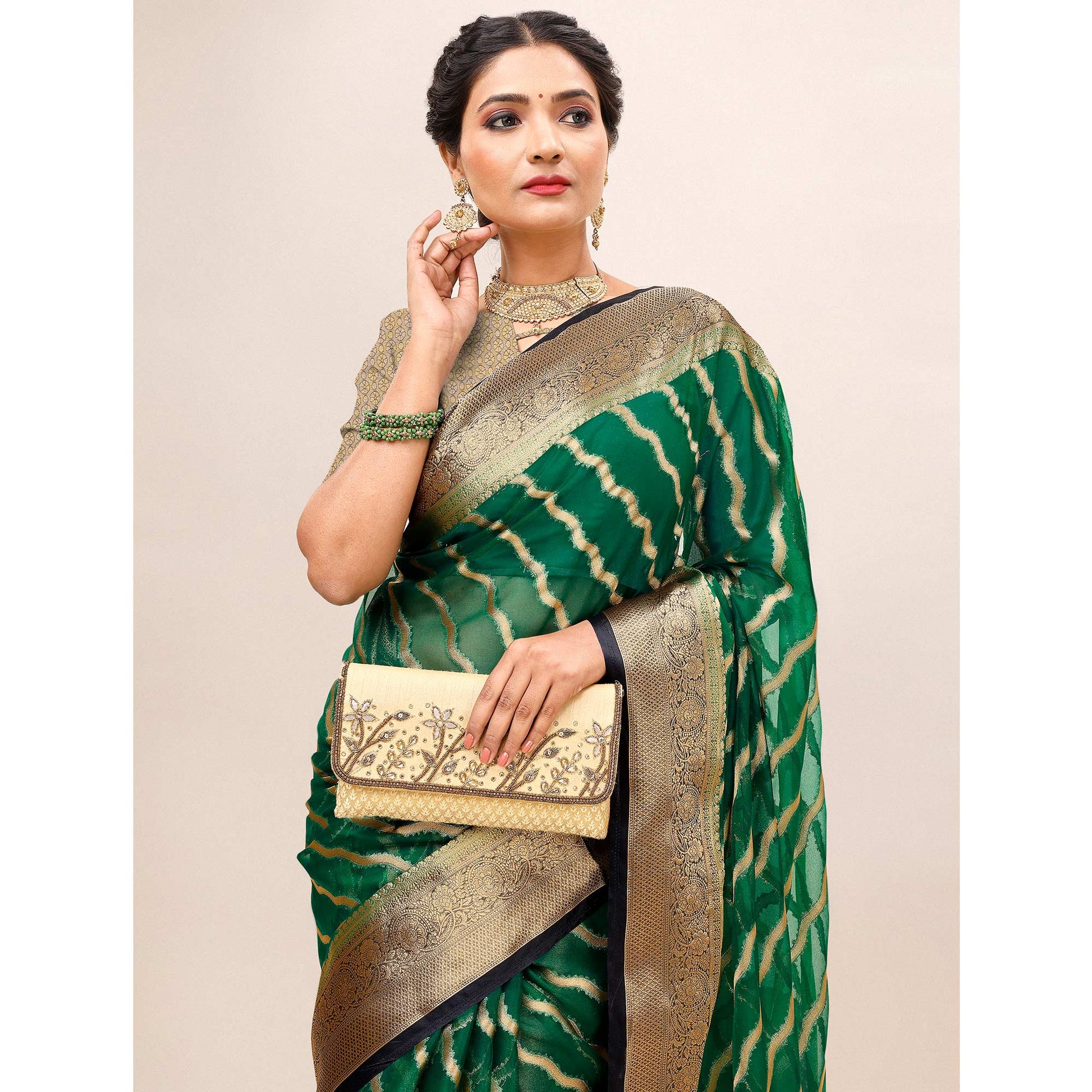 green-woven-organza-saree-with-tassels-23