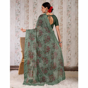 green-floral-digital-printed-lycra-saree-wirh-embroidered-border