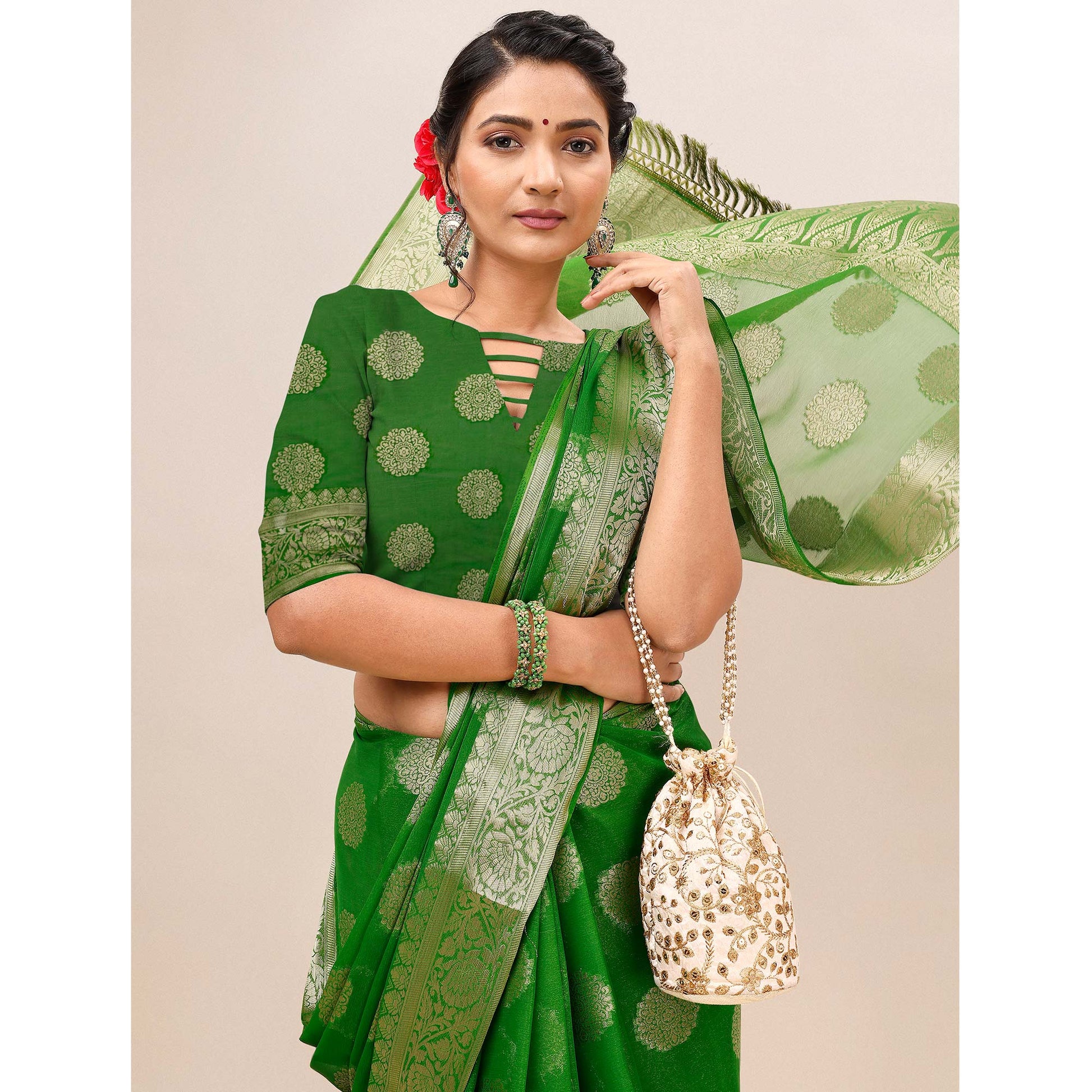 green-woven-chiffon-saree-with-tassels