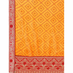 Bright Orange Bandhani Foil Printed Chiffon Saree With Tassels