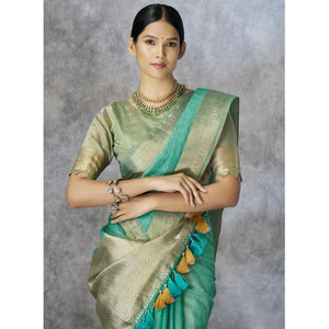 Turquoise Woven Cotton Silk Saree With Tassels