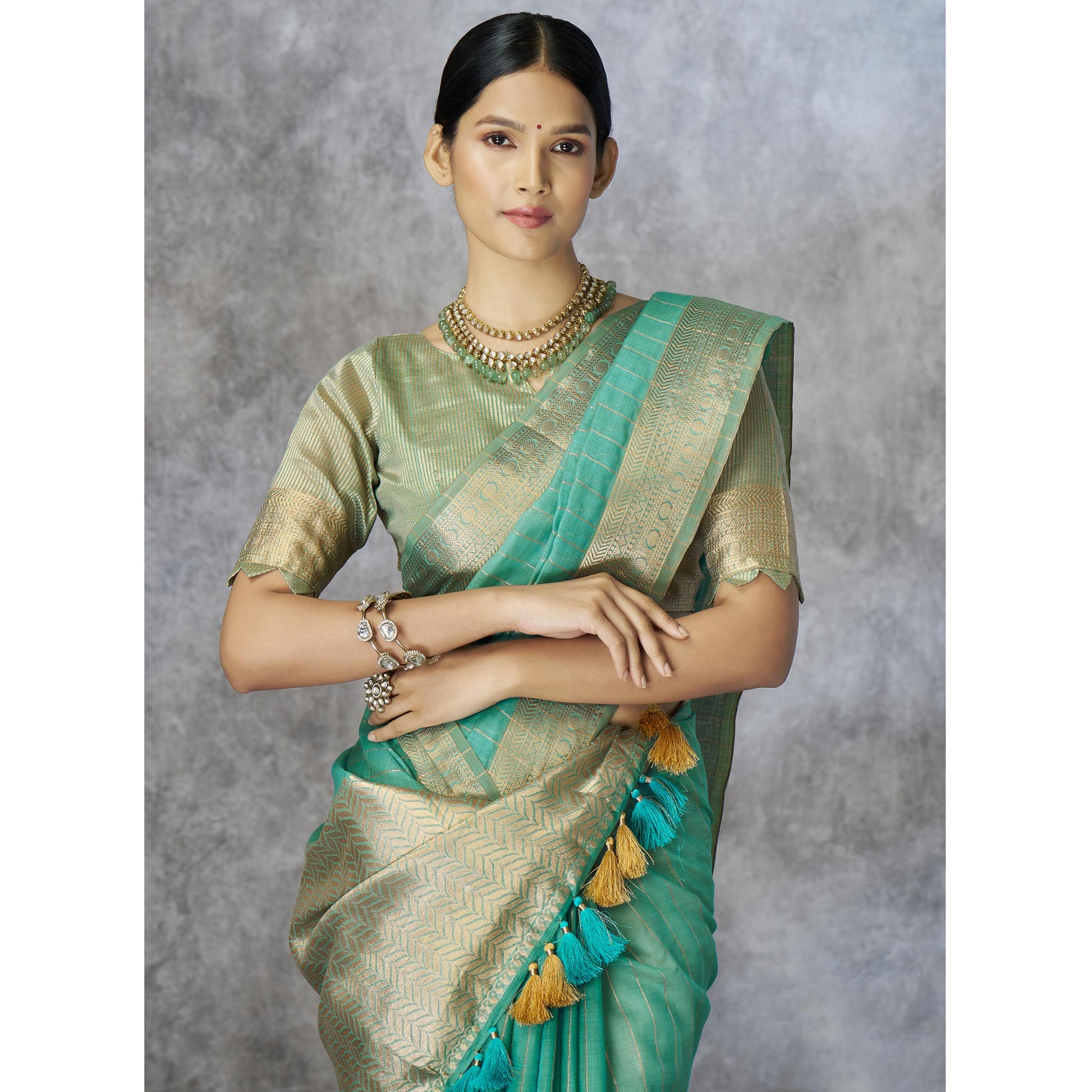 Turquoise Woven Cotton Silk Saree With Tassels