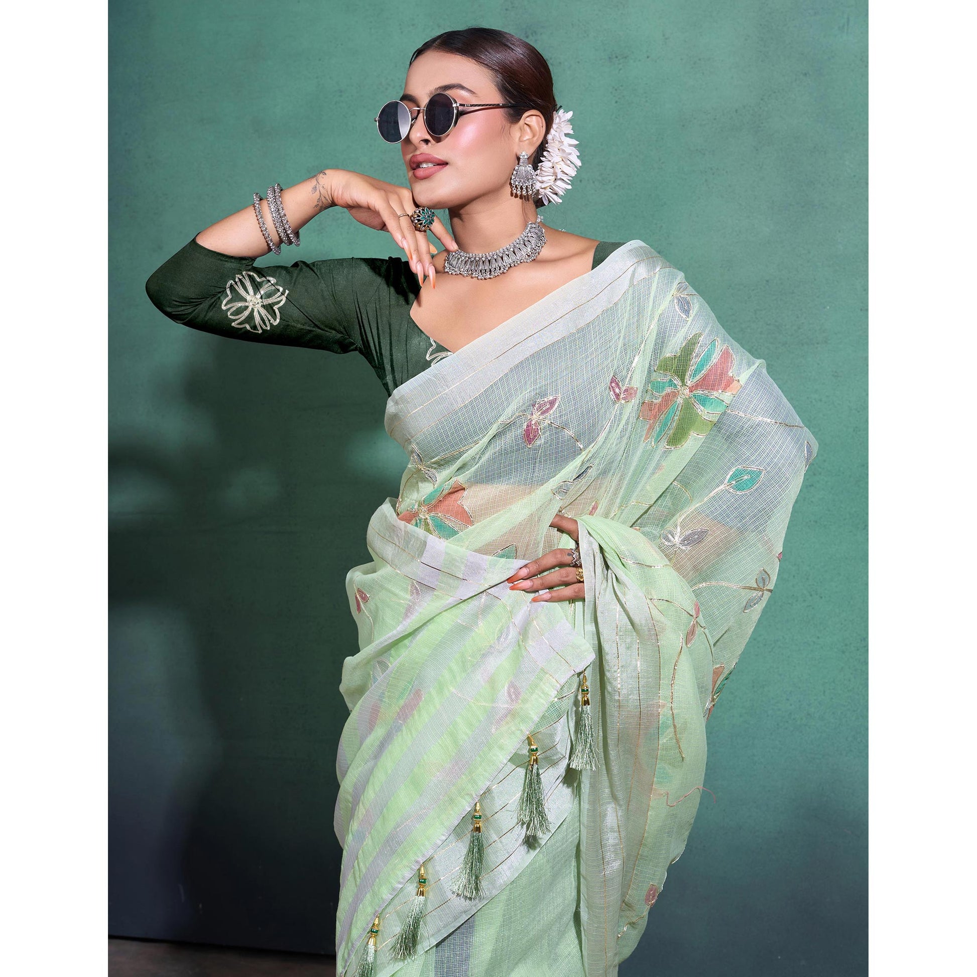 green-gota-patti-embroidered-linen-saree-with-tassels