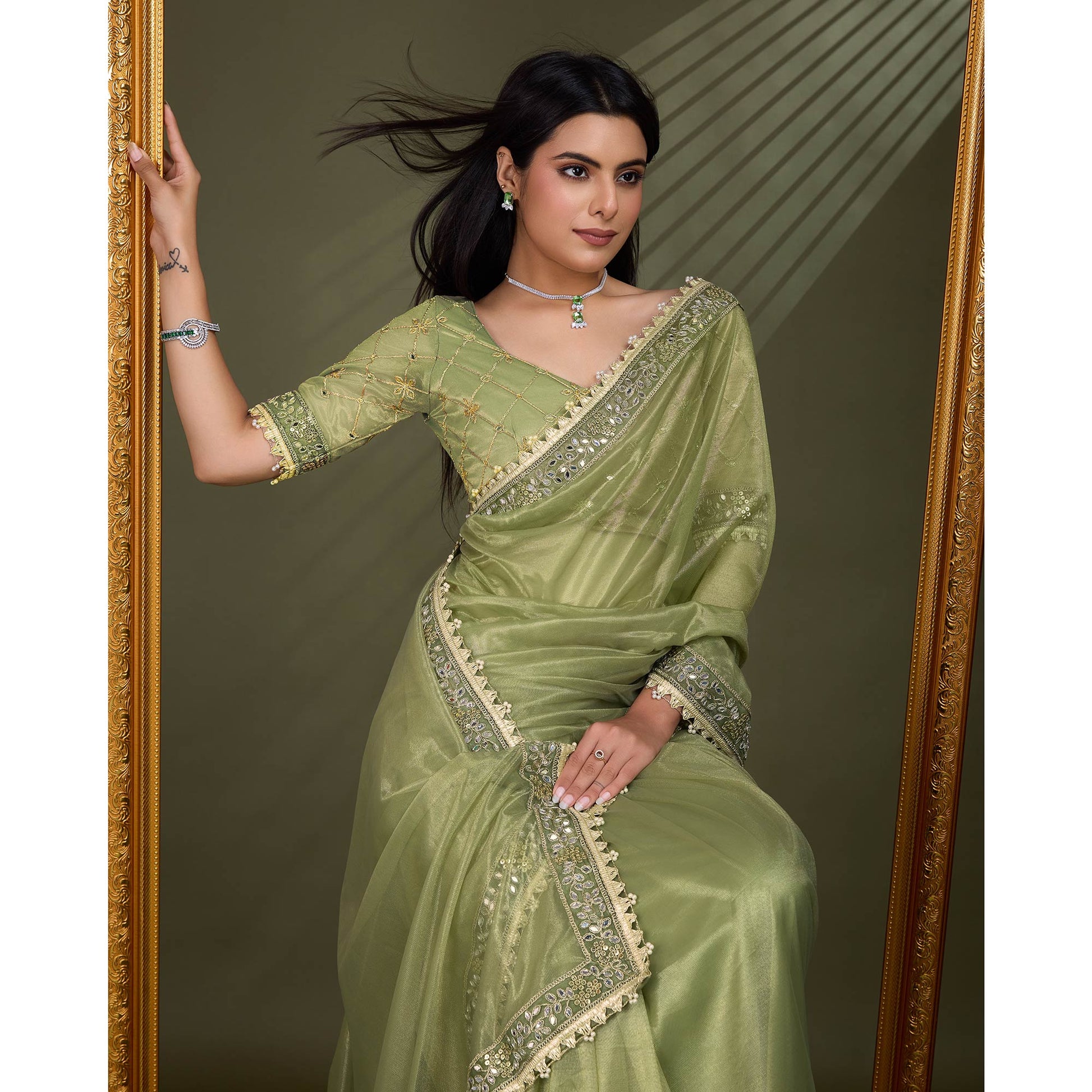 green-sequins-embroidery-with-mirror-handwork-twill-net-saree