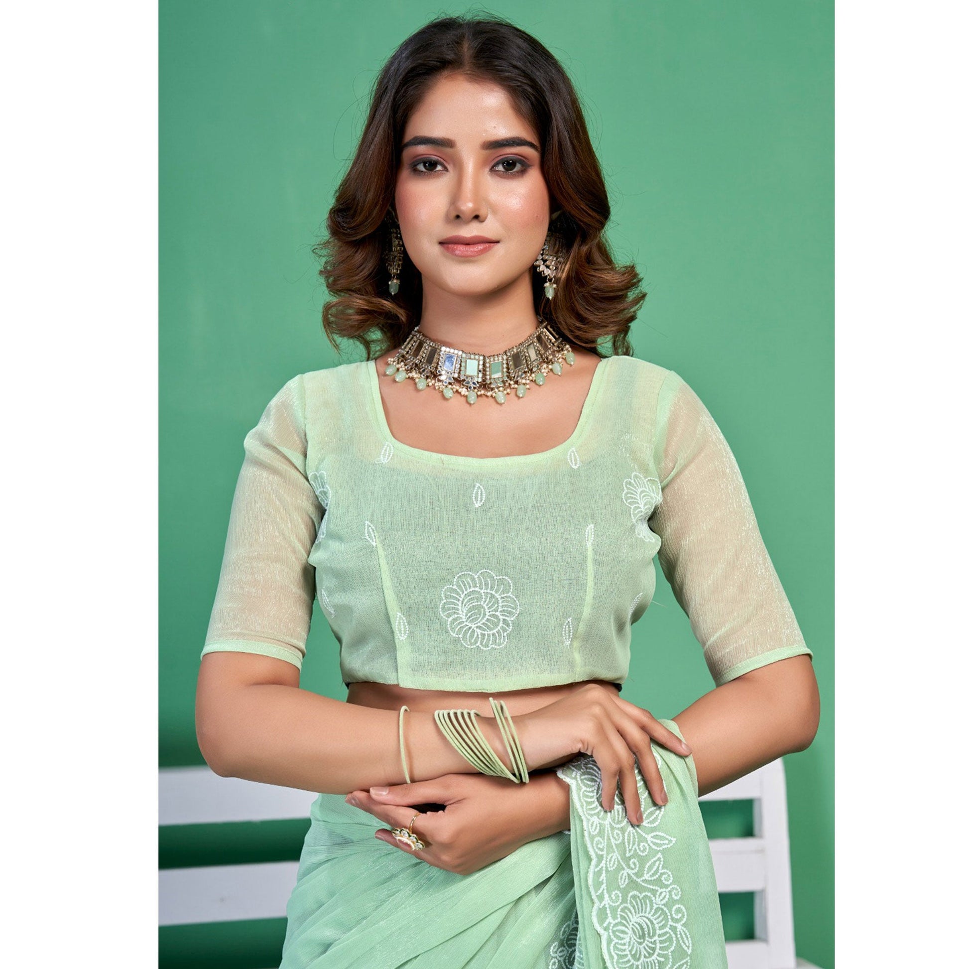 green-chiffon-saree-with-embroidered-border