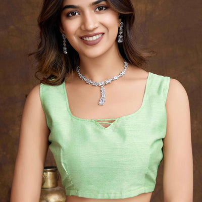 green-floral-sequins-embroidered-organza-silk-saree