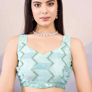 Light Turquoise Sequins Embroidered Twill Net Saree