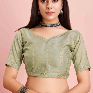 green-solid-with-floral-sequins-embroidered-jimmy-choo-tissue-saree