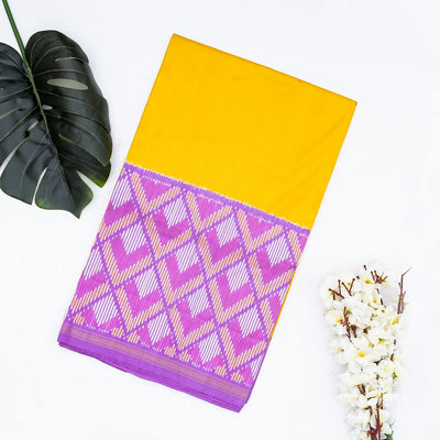Turmeric Yellow Handloom Ikat Silk Saree With Contrast Lavender Border
