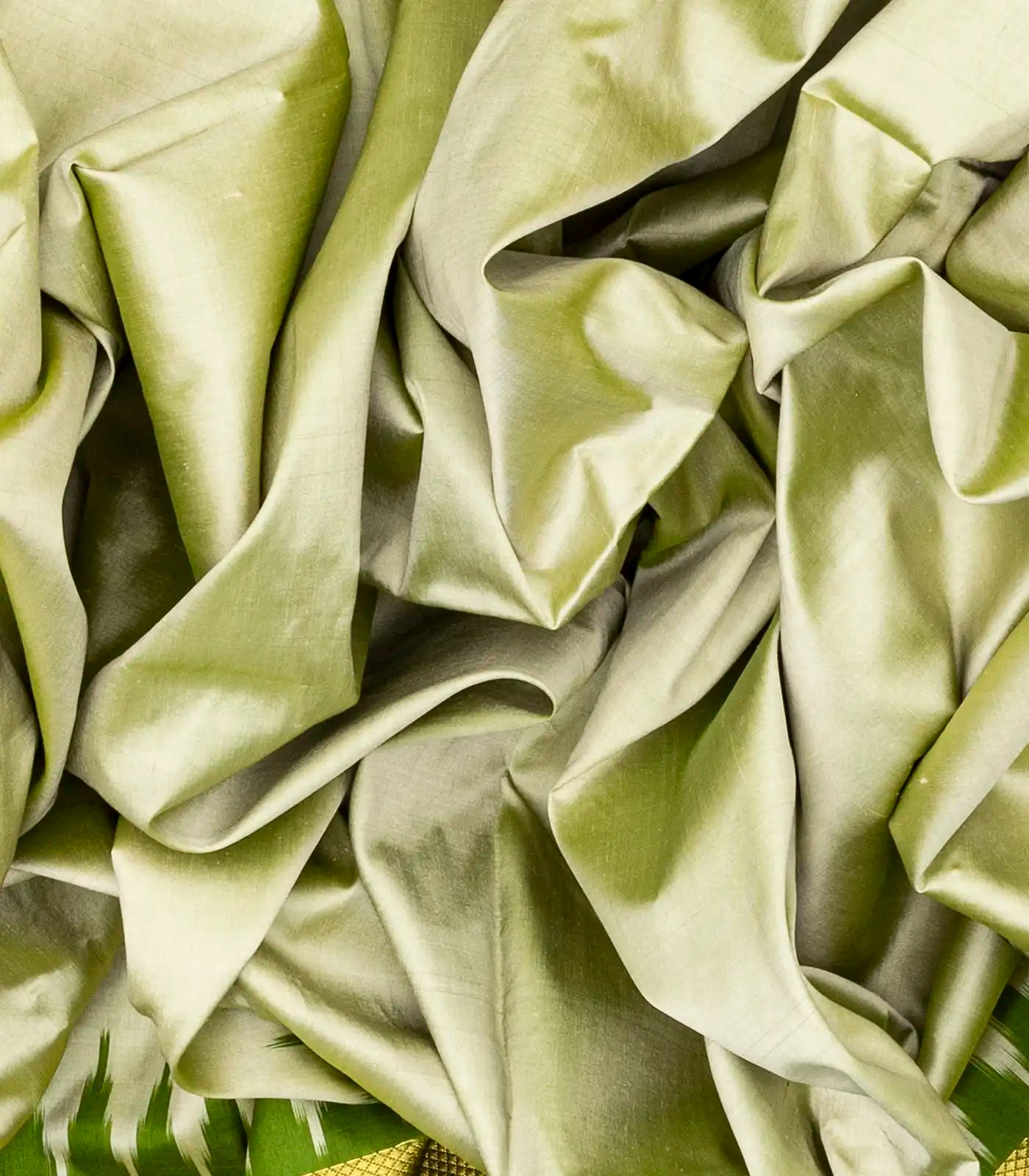 Light Green Handloom Ikat Silk Saree With Contrast Green Border