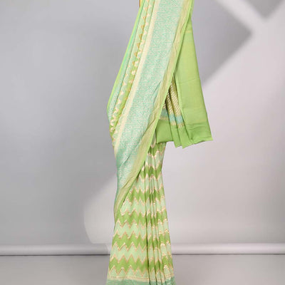 Green zig-zag striped banaras georgette saree with contrast border & geometric design pallu