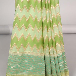 Green zig-zag striped banaras georgette saree with contrast border & geometric design pallu