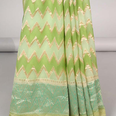 Green zig-zag striped banaras georgette saree with contrast border & geometric design pallu