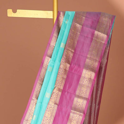 Blue geometric buttas silk saree with contrast rettai pettu brorder of traditional designs & intricate zari design pallu