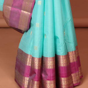 Blue geometric buttas silk saree with contrast rettai pettu brorder of traditional designs & intricate zari design pallu