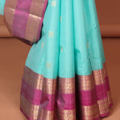 Blue geometric buttas silk saree with contrast rettai pettu brorder of traditional designs & intricate zari design pallu