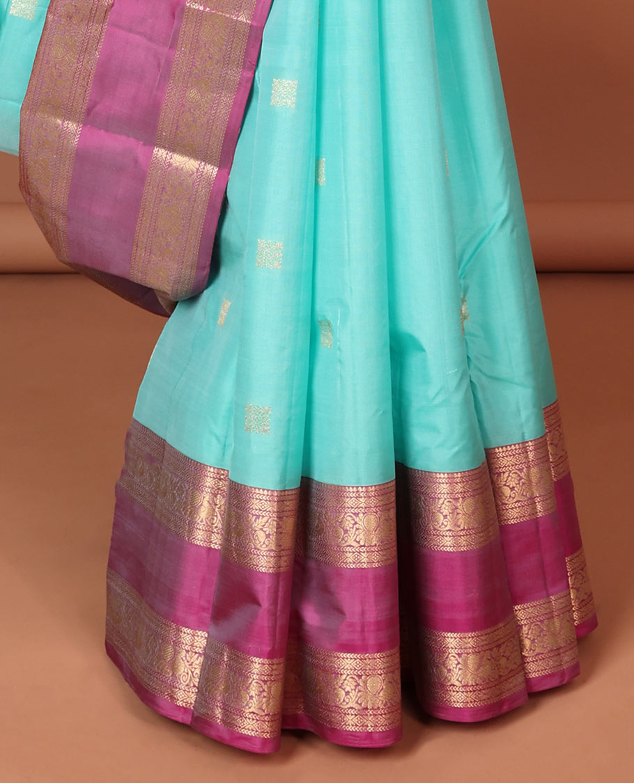 Blue geometric buttas silk saree with contrast rettai pettu brorder of traditional designs & intricate zari design pallu