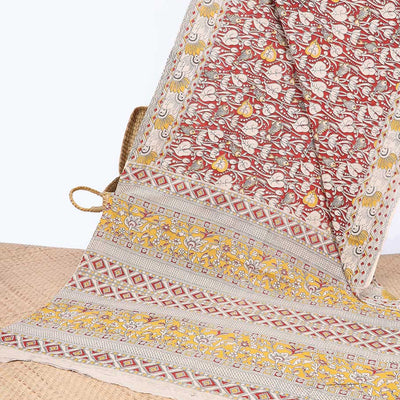 Red unique floral machine-printed kalamkari cotton saree, contrast floral border & floral & diamond pallu