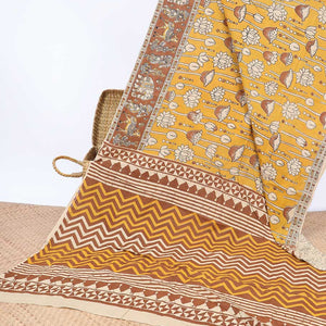 Orange floral motifs machine-printed kalamkari cotton saree, contrast unique motifs border & chevron striped pallu