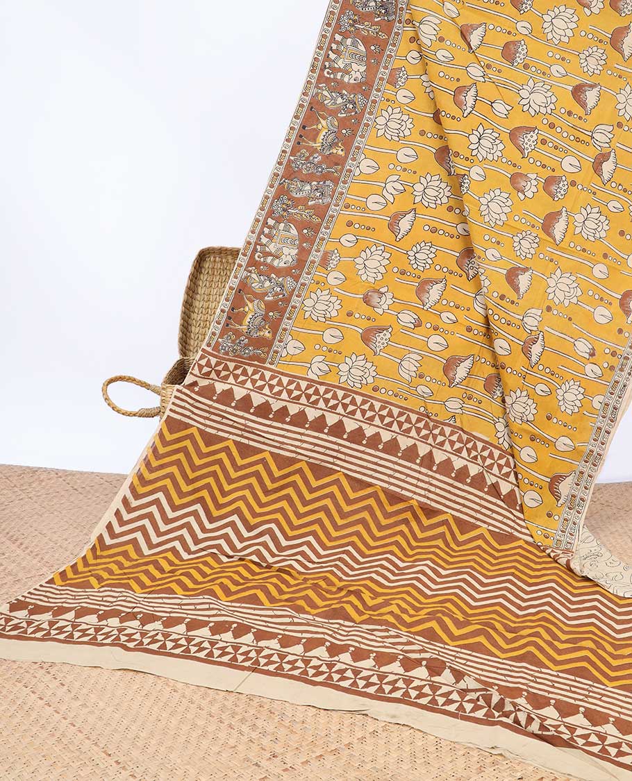 Orange floral motifs machine-printed kalamkari cotton saree, contrast unique motifs border & chevron striped pallu