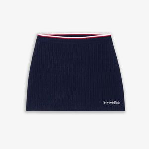 SPORTY & RICH | SERIF LOGO MINI CABLE SKIRT { NAVY