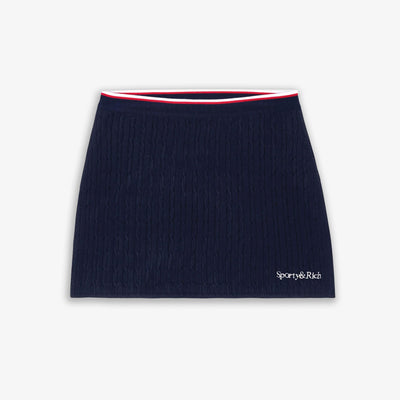 SPORTY & RICH | SERIF LOGO MINI CABLE SKIRT { NAVY