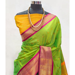 green-zari-woven-lichi-art-silk-saree-with-tassels