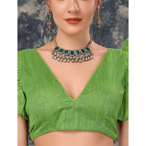 green-printed-with-zari-work-chiffon-saree-with-lace-border
