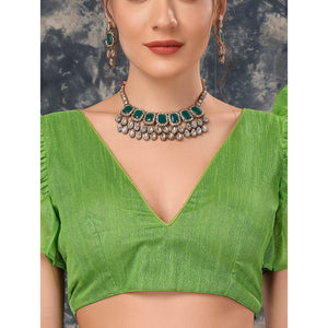 green-geometric-printed-chiffon-saree-with-lace-border