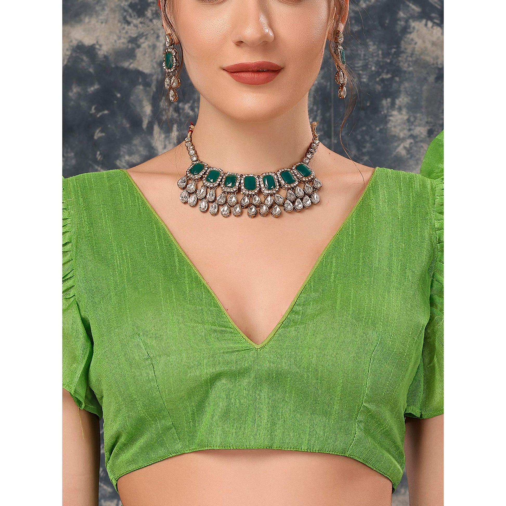 green-geometric-printed-chiffon-saree-with-lace-border
