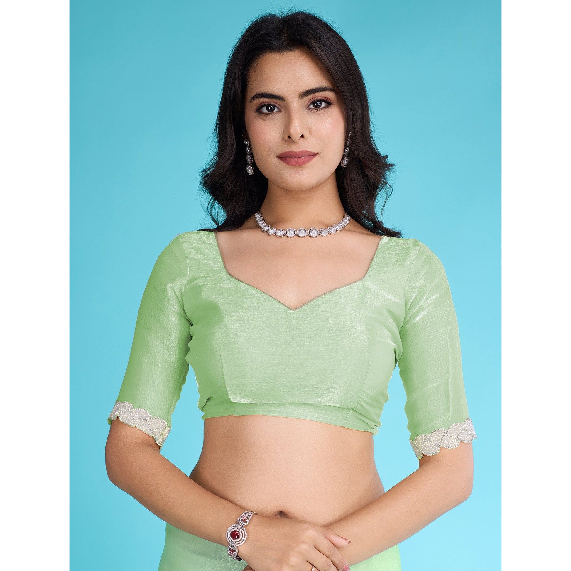 green-solid-with-zarkan-ceramic-pearl-diamond-lace-tissue-saree