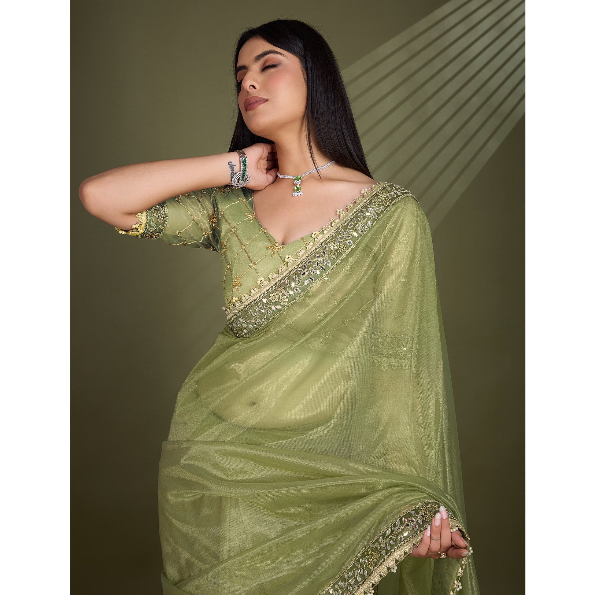 green-sequins-embroidery-with-mirror-handwork-twill-net-saree