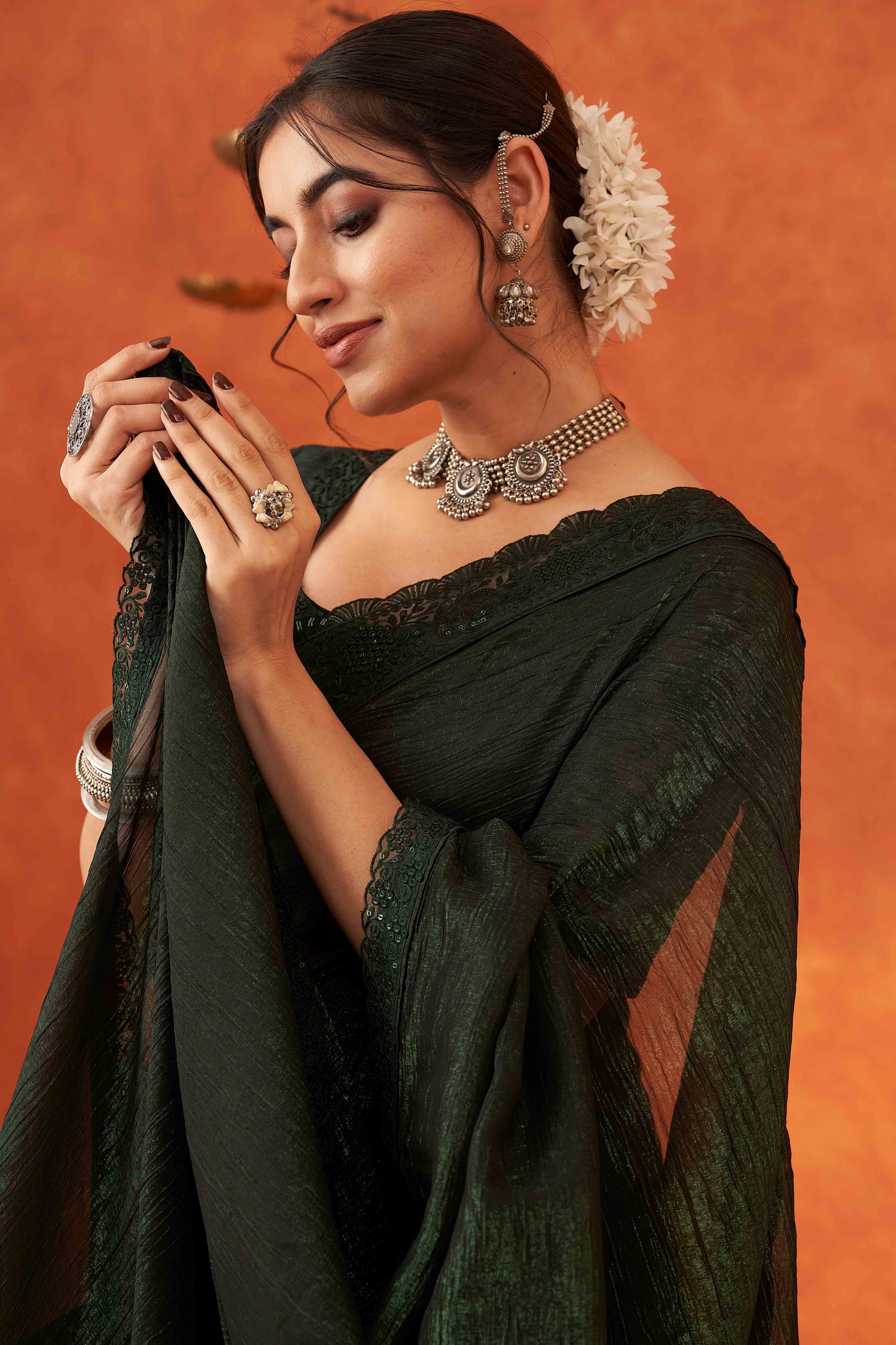 green-embroidered-crunchy-soft-net-saree-with-embellished-border