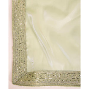 green-solid-with-floral-sequins-embroidered-jimmy-choo-tissue-saree