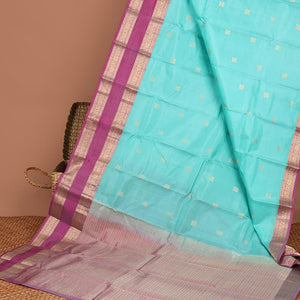 Blue geometric buttas silk saree with contrast rettai pettu brorder of traditional designs & intricate zari design pallu