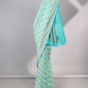 Blue rangkat-style jacquard design banaras georgette saree with zari border & intricate floral design pallu
