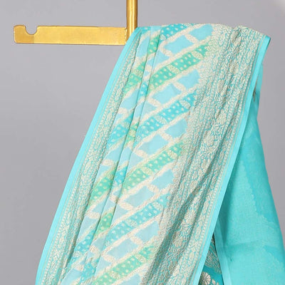 Blue rangkat-style jacquard design banaras georgette saree with zari border & intricate floral design pallu
