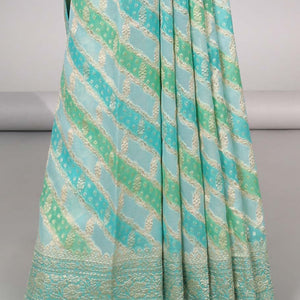 Blue rangkat-style jacquard design banaras georgette saree with zari border & intricate floral design pallu