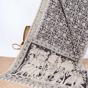Black floral machine-printed kalamkari cotton saree, self-border & pallu of Pichwai cow & radha krishna motif