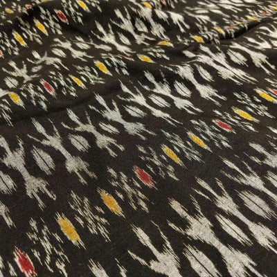 White Tribal on Black with Red & Yellow Motif Cotton Ikat  Fabric