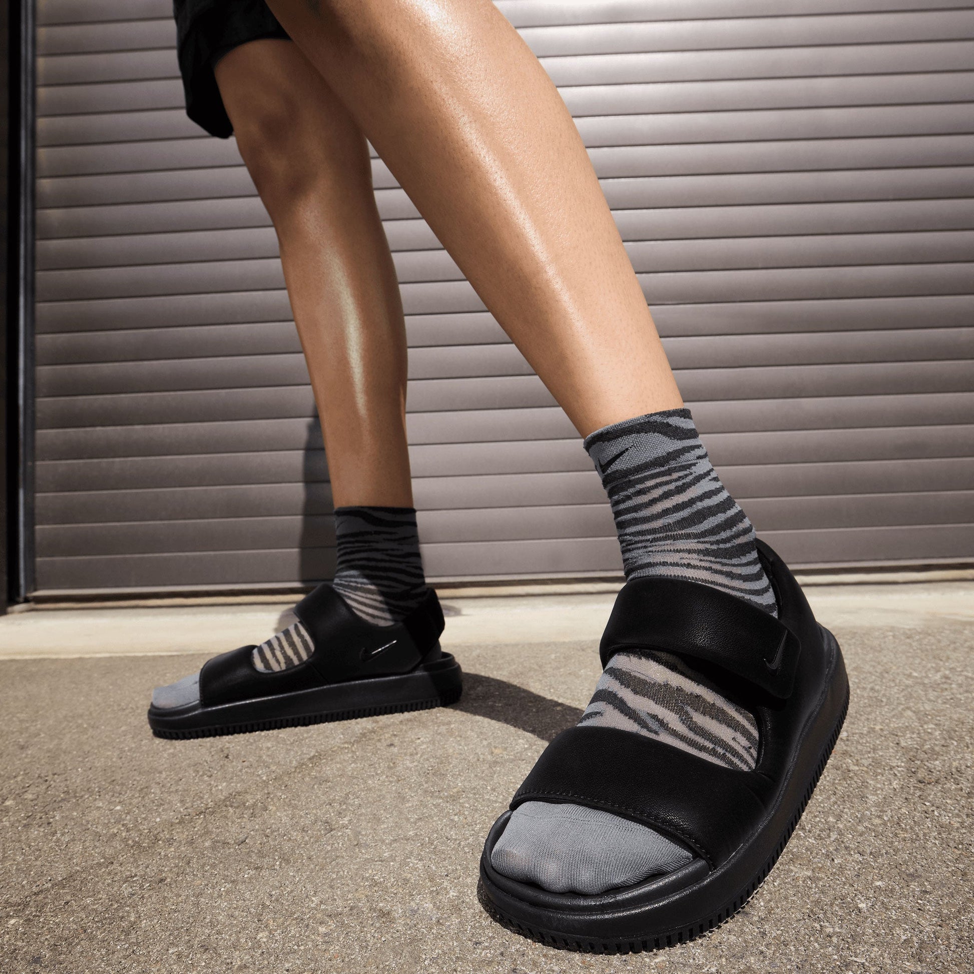 Nike | CALM SANDALS  { BLACK/BLACK-BLACK