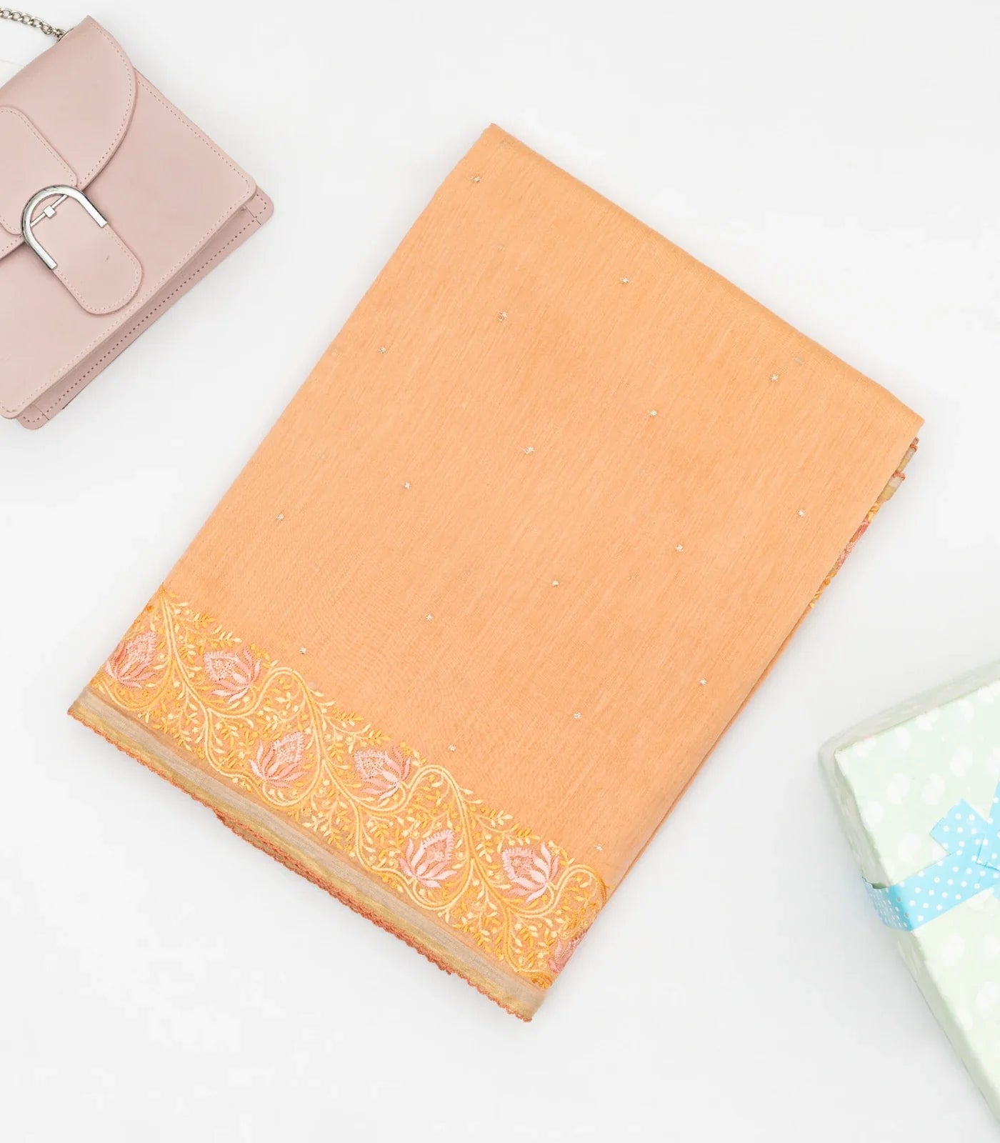 Peach Handwoven Linen Saree Embroidered With Floral Motifs