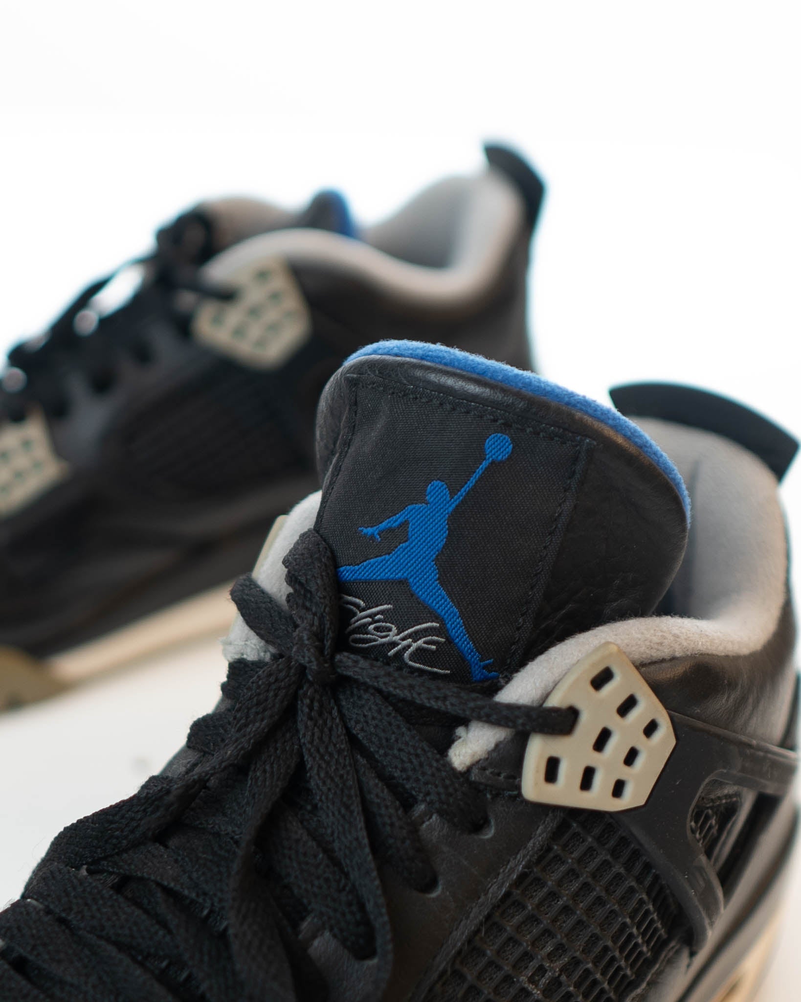 Nike Air Jordans 4  Black Leather Jordan 4 Retro Motorsports Alternate Sneakers