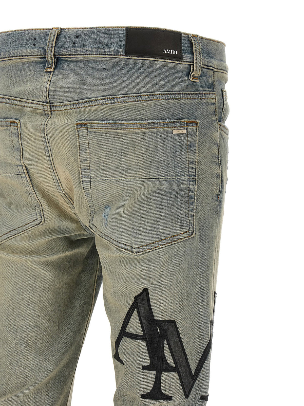 Amiri Staggered Logo Jeans
