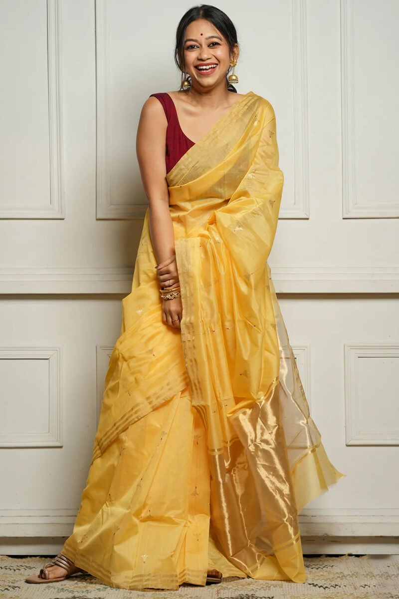Ravishing Yellow Cotton Silk Saree With Marvellous Blouse Piece