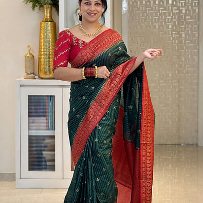 Enamoring Dark Green Soft Silk Saree With Jazzy Blouse Piece