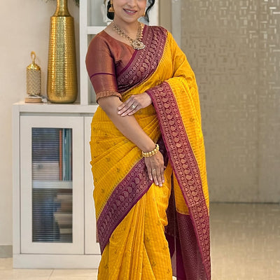 Adorning Yellow Soft Silk Saree With Unique Blouse Piece