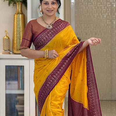 Adorning Yellow Soft Silk Saree With Unique Blouse Piece