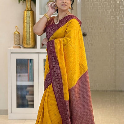 Adorning Yellow Soft Silk Saree With Unique Blouse Piece
