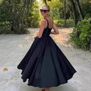 Rigata Holiday Statement Maxi Dress in Black
